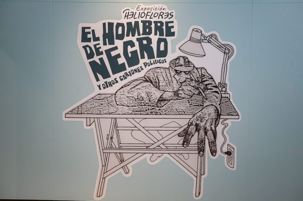 Adornan 130 cartones de Helioflores las paredes de Los Pinos 9 Helioflores los pinos hombre de negro monero cartón